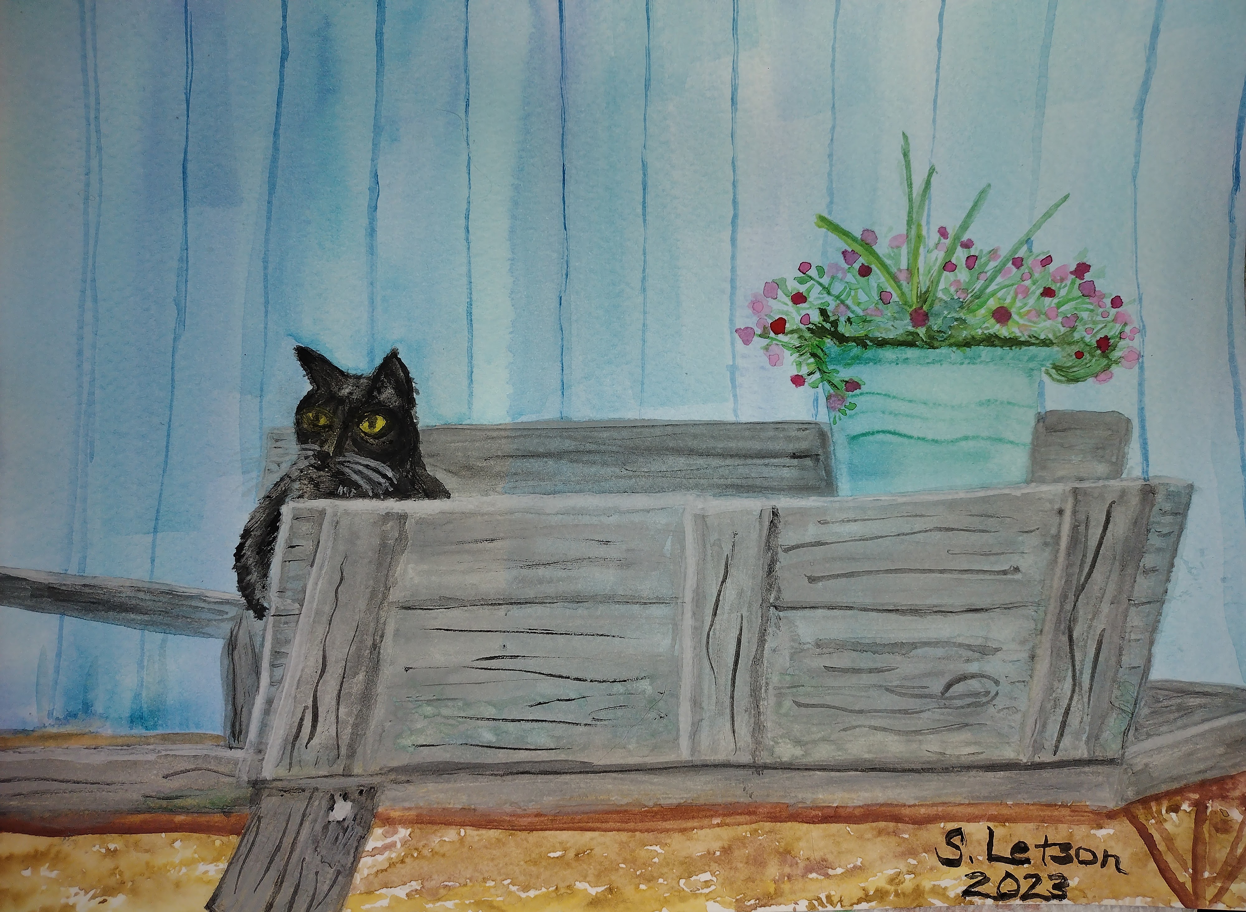 Watercolor painting of a black cat sitting in a decorative wheelbarrel with a large planter of flowers against a blue shed.